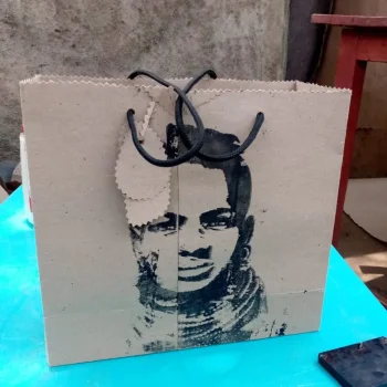 finished khaki bag with elegant face portrait sketch